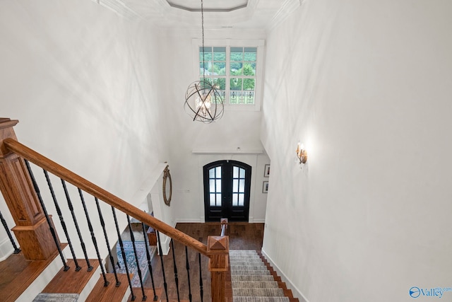 11 SE Braewick Pl, Gurley, AL 35748 - foyer entrance with a chandelier, wood finished floors, stairs, a towering ceiling, and french doors