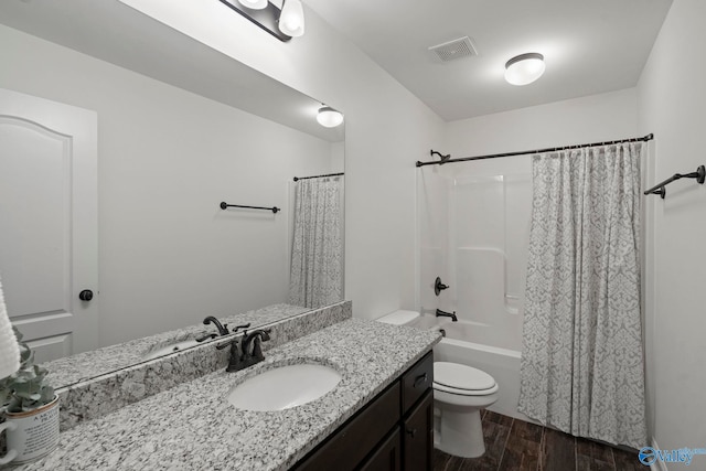 11 SE Braewick Pl, Gurley, AL 35748 - bathroom featuring wood finished floors, vanity, toilet, and shower / bath combination with curtain
