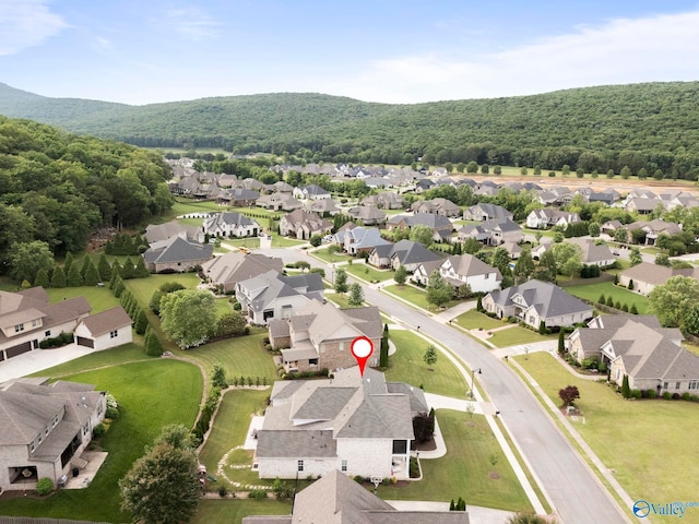 11 SE Braewick Pl, Gurley, AL 35748 - aerial perspective of suburban area with a heavily wooded area
