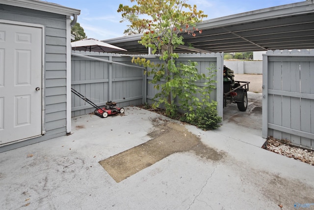 view of patio / terrace featuring fence