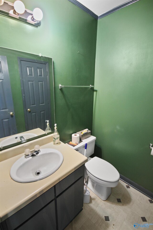 bathroom with vanity and toilet