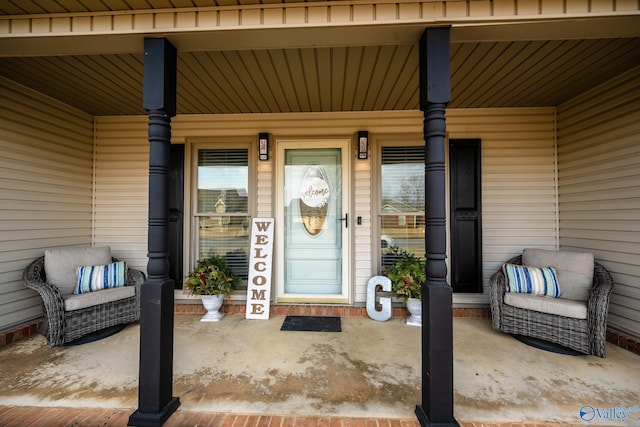doorway to property with covered porch