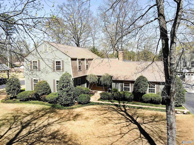 view of front of property featuring a chimney