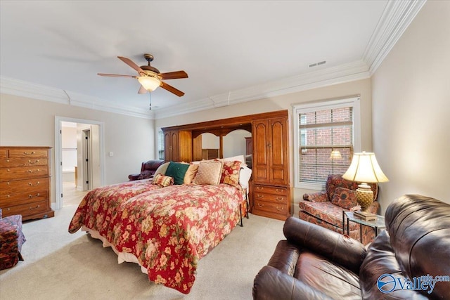 bedroom with light carpet, ceiling fan, and ornamental molding