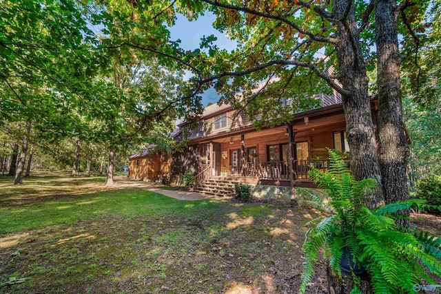 251 Wells St, Mentone, AL 35984 - back of house with a lawn and a porch