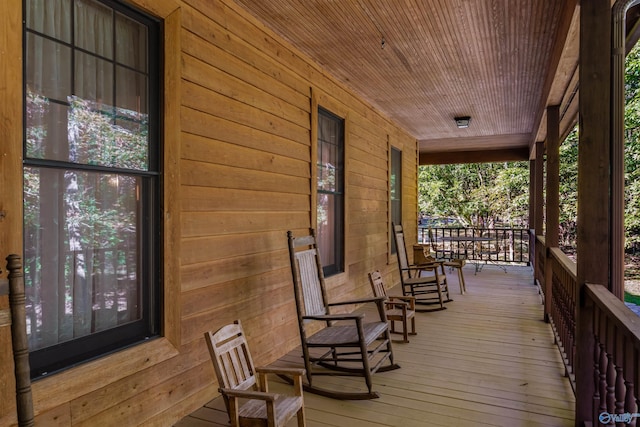 wooden deck featuring a porch