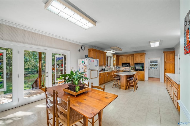 251 Wells St, Mentone, AL 35984 - dining area with light floors, ornamental molding, and french doors