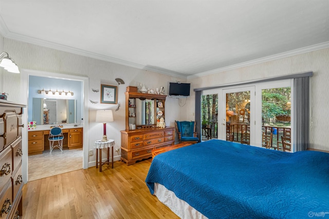 bedroom with ensuite bath, crown molding, access to exterior, and light hardwood / wood-style floors