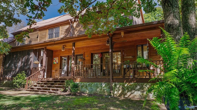 back of house with a porch