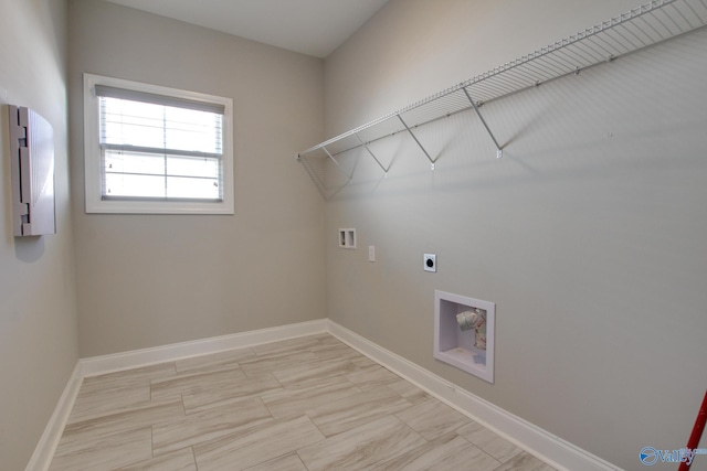 laundry area with washer hookup, laundry area, hookup for an electric dryer, and baseboards