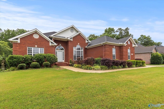 view of front of home with a front yard