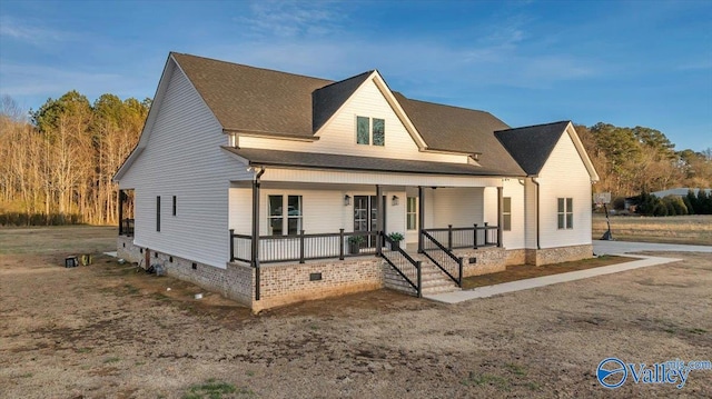 view of front of property with covered porch and crawl space