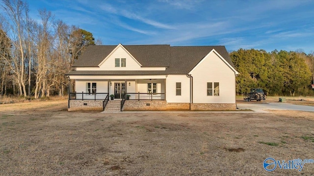 modern farmhouse featuring covered porch