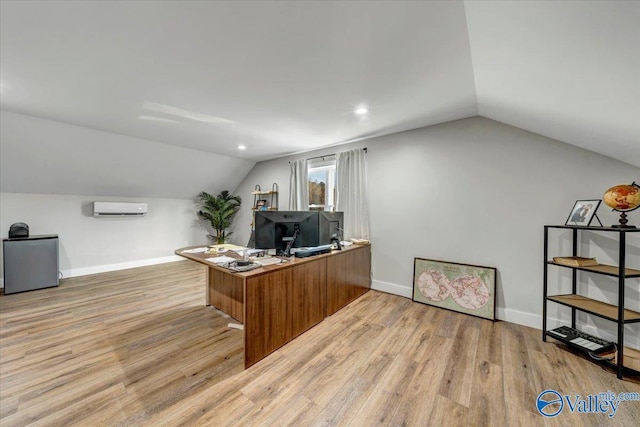 office space featuring lofted ceiling, baseboards, and light wood-style floors