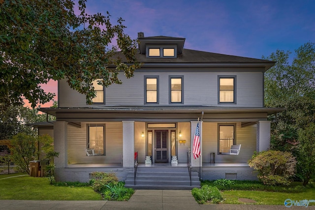 view of front of home with covered porch