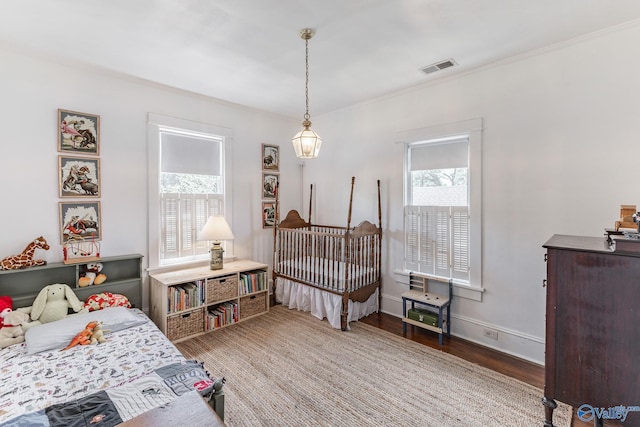 bedroom featuring hardwood / wood-style flooring