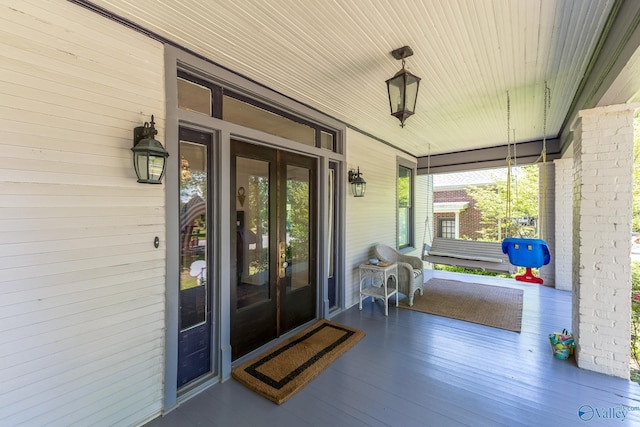 entrance to property with a porch