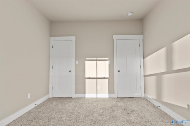 unfurnished bedroom with carpet floors