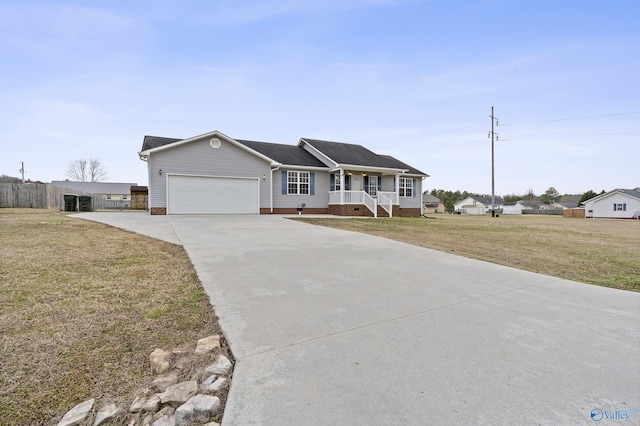 single story home with an attached garage, driveway, a front yard, and fence