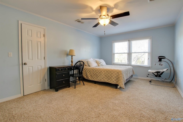 bedroom featuring light carpet, ornamental molding, and ceiling fan