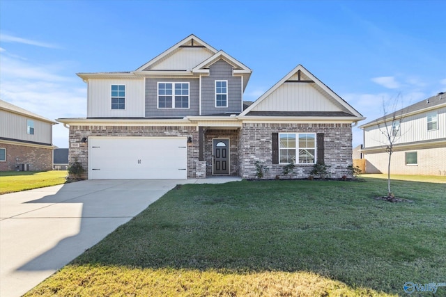 craftsman-style house featuring a garage and a front lawn