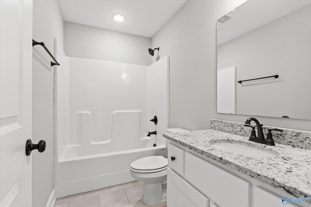 full bathroom with tile patterned flooring, vanity, bathtub / shower combination, and toilet