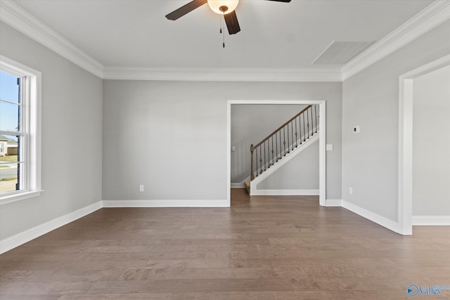 spare room with hardwood / wood-style floors, ceiling fan, and crown molding