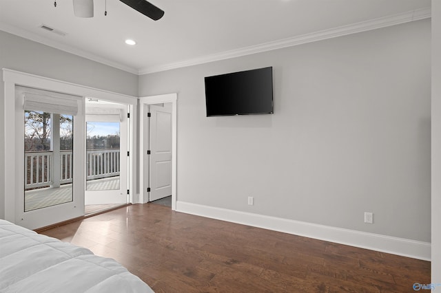 unfurnished bedroom featuring wood finished floors, visible vents, baseboards, access to outside, and ornamental molding