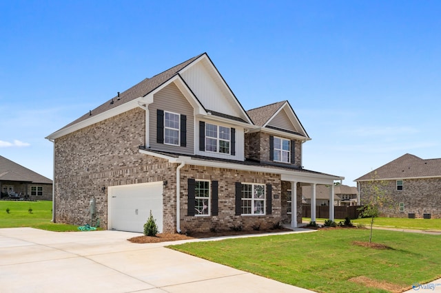 view of front facade with a front lawn and a garage