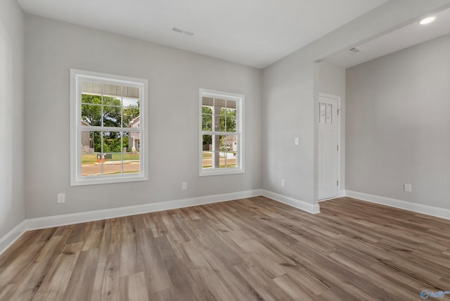 empty room featuring hardwood / wood-style floors