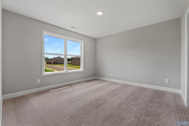 empty room featuring carpet floors