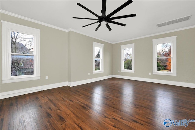 empty room featuring ceiling fan, dark hardwood / wood-style flooring, and ornamental molding