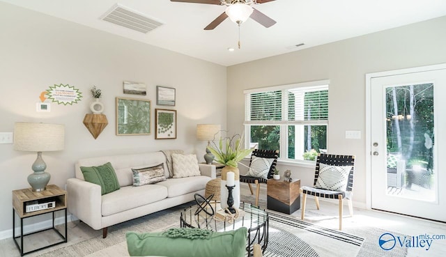 211 Bent Creek Ln, New Market, AL 35761 - living room with a ceiling fan, wood finished floors, and baseboards