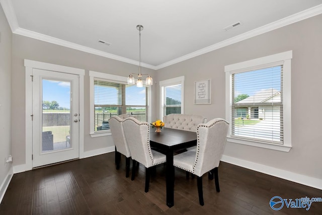 14614 Demarie Ln, Athens, AL 35613 - dining room featuring ornamental molding, dark wood-type flooring, and a chandelier