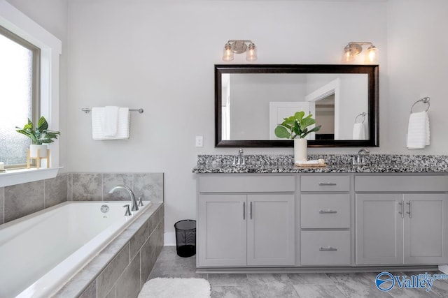 14614 Demarie Ln, Athens, AL 35613 - bathroom with double vanity, plenty of natural light, and a garden tub