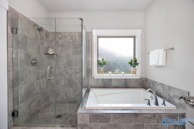 14614 Demarie Ln, Athens, AL 35613 - bathroom with a bath and a shower stall