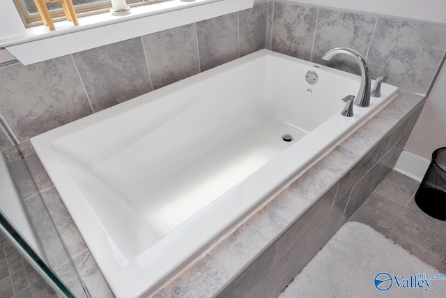 14614 Demarie Ln, Athens, AL 35613 - bathroom with a garden tub and baseboards