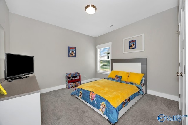 14614 Demarie Ln, Athens, AL 35613 - carpeted bedroom featuring baseboards