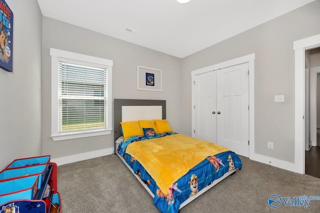 14614 Demarie Ln, Athens, AL 35613 - carpeted bedroom featuring baseboards and a closet