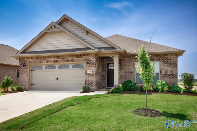 14614 Demarie Ln, Athens, AL 35613 - view of front of home with brick siding, a garage, a front lawn, concrete driveway, and a shingled roof