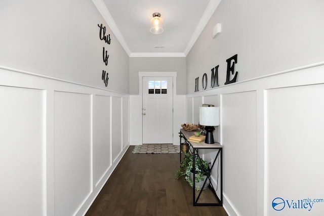 14614 Demarie Ln, Athens, AL 35613 - doorway to outside featuring a decorative wall, wainscoting, crown molding, and dark wood-type flooring