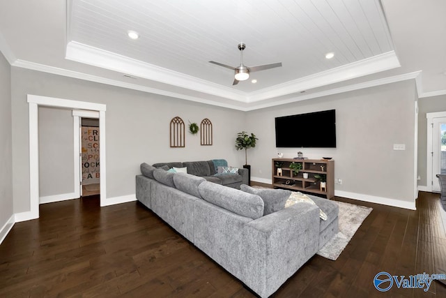 14614 Demarie Ln, Athens, AL 35613 - living room with a raised ceiling, ceiling fan, ornamental molding, dark wood-style floors, and recessed lighting