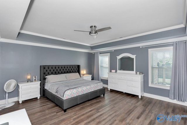 bedroom featuring baseboards, ornamental molding, and wood finished floors