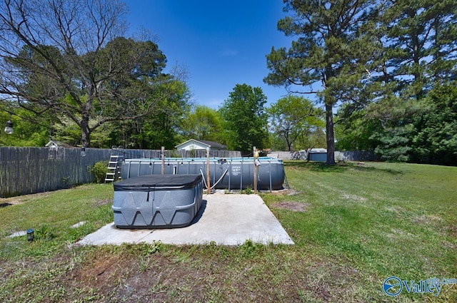 view of yard with a fenced in pool and a fenced backyard