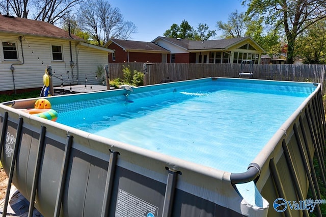 view of pool with a fenced in pool and a fenced backyard