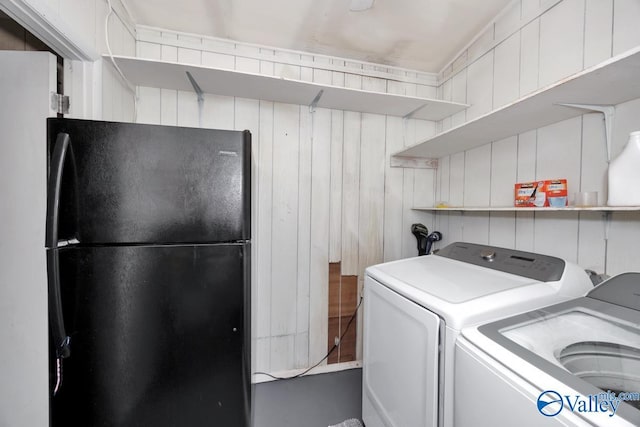 laundry room featuring washer and clothes dryer and laundry area