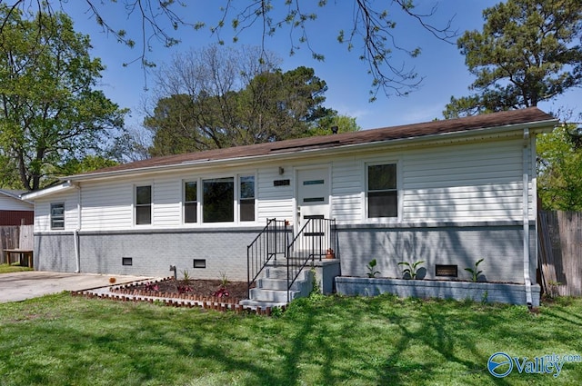 ranch-style home featuring brick siding, crawl space, a front lawn, and fence