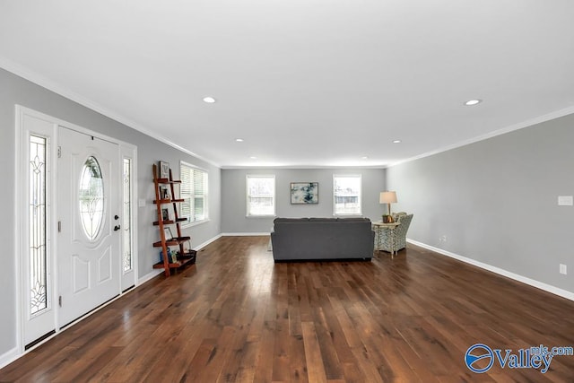 unfurnished living room with crown molding, baseboards, dark wood-type flooring, and recessed lighting