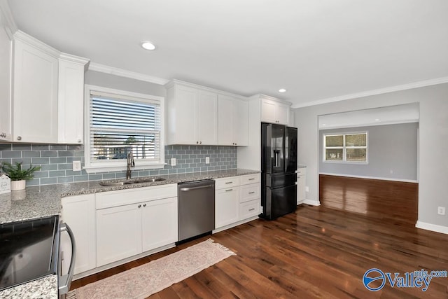 kitchen with electric range oven, stainless steel dishwasher, a sink, light stone countertops, and black fridge