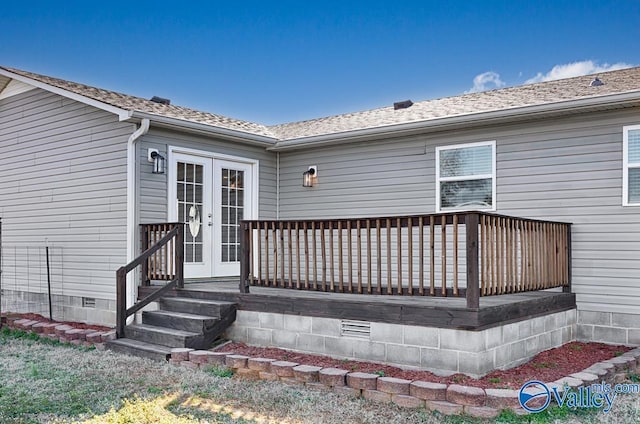 wooden deck featuring french doors